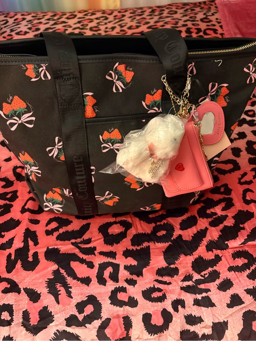 Black juicy couture tote bag with bag charms( super cute for back to school)